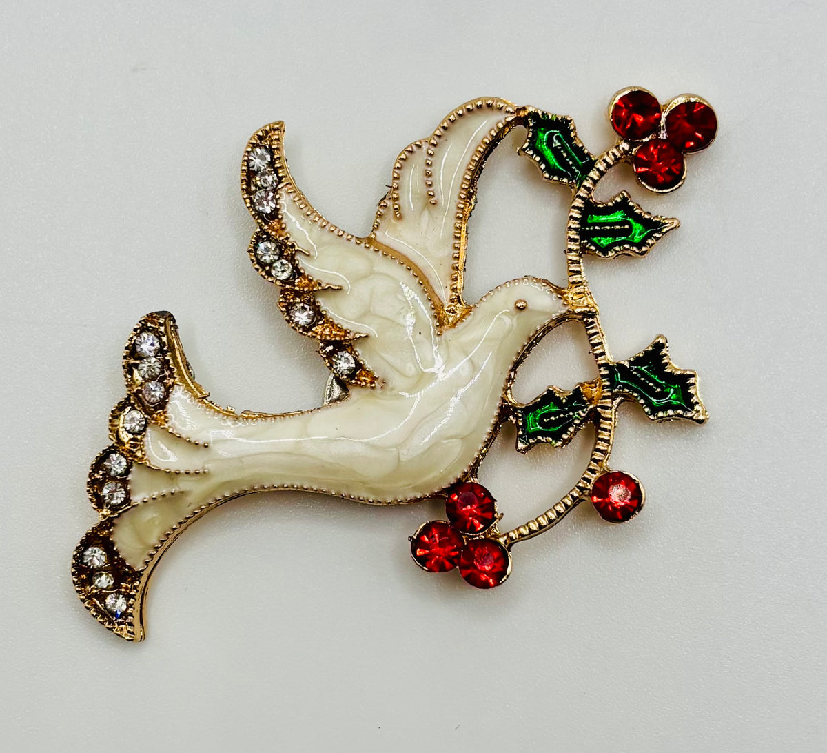 Enamel dove with red crystal branch needle minder — white background