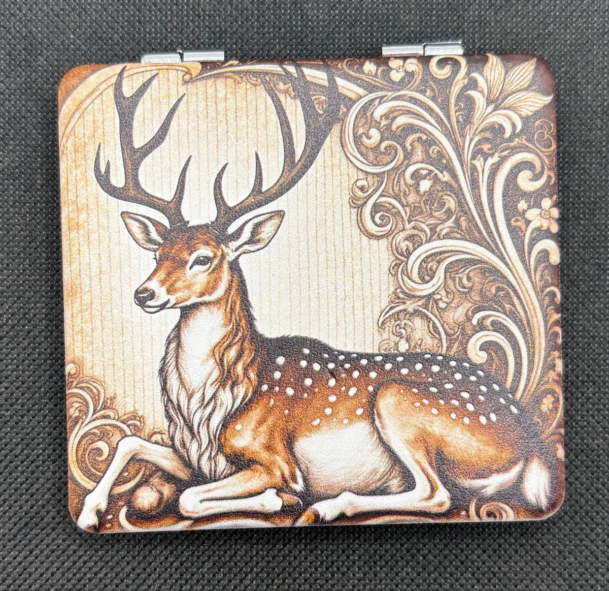 Elegant Buck Bead Case on dark fabric