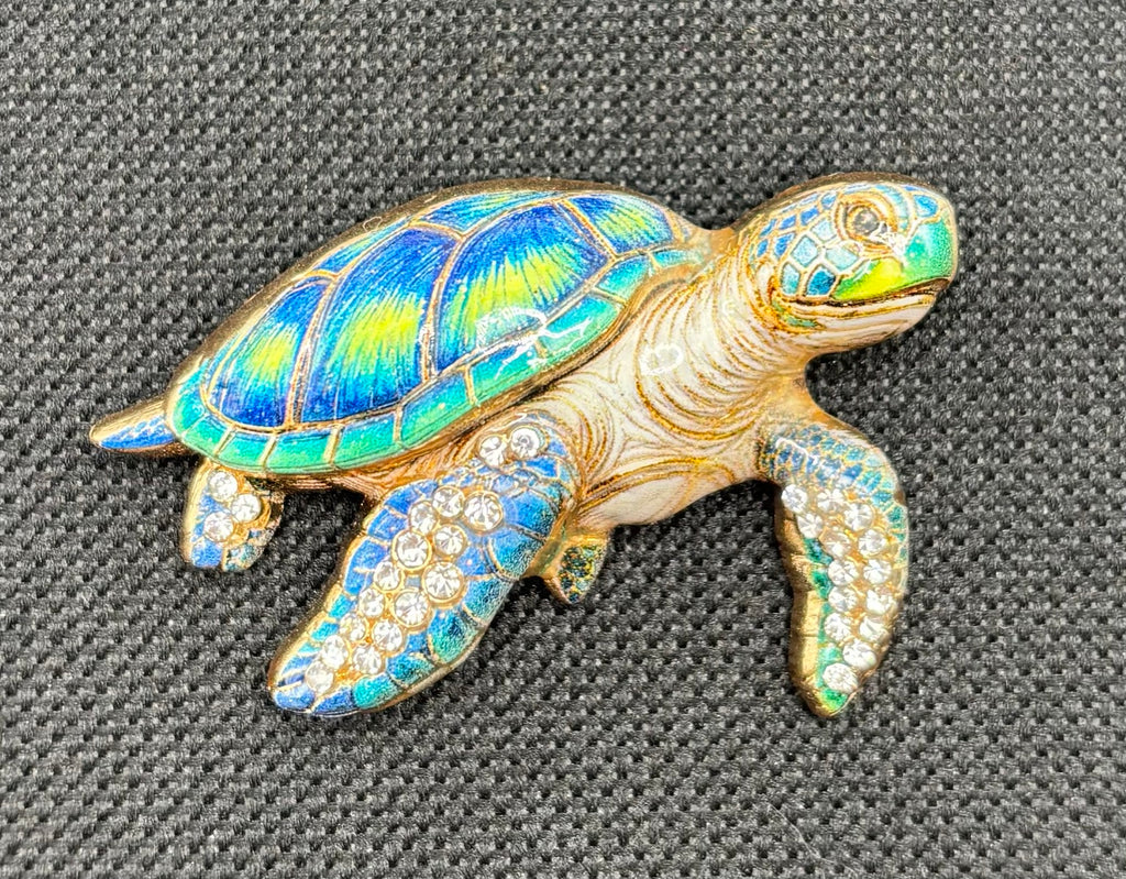 Gorgeous Enamel Crystal Green Sea Turtle Needle Minder on dark fabric