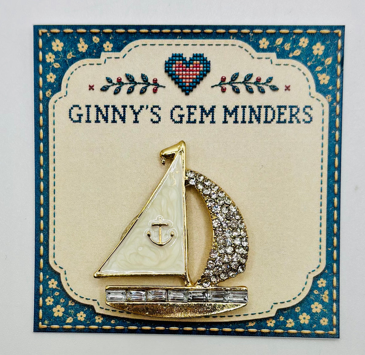 Enamel and crystal sailboat needle minder — display card