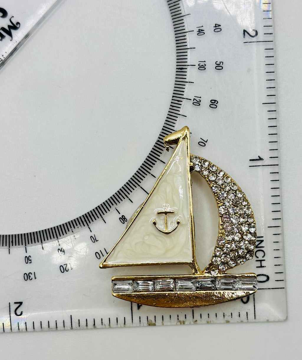 Enamel and crystal sailboat needle minder — ruler scale