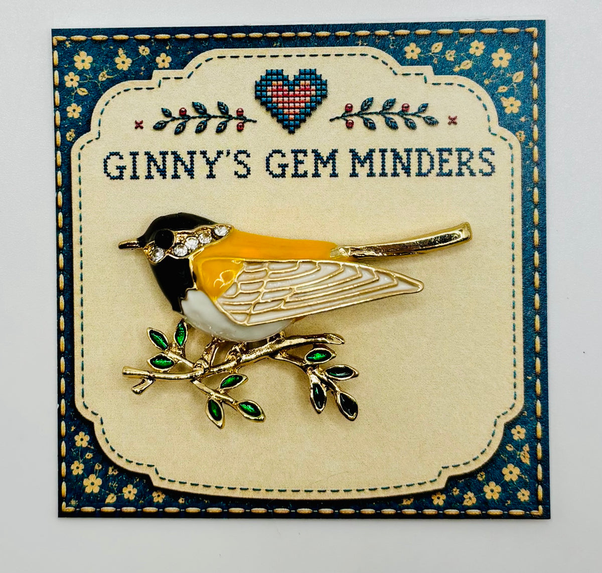 Enamel and crystal goldfinch needle minder — display card
