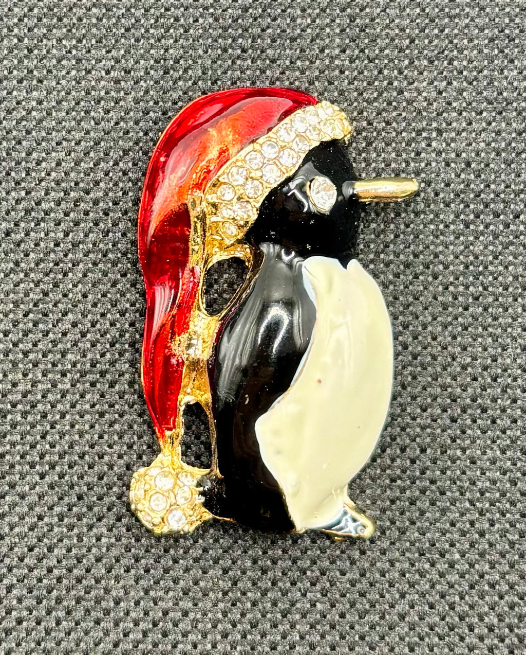 Enamel and crystal penguin needle minder — dark fabric