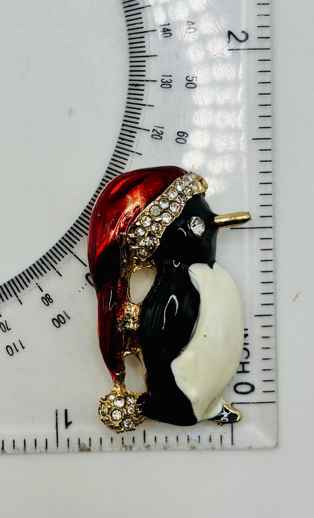 Enamel and crystal penguin needle minder — ruler scale
