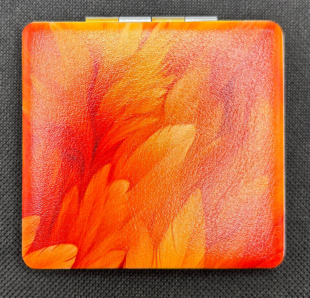 Flaming Orange Feathers Bead Case on dark fabric