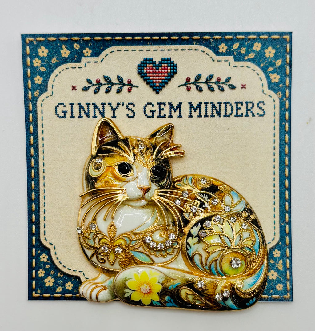 Floral crystal cat needle minder on display card