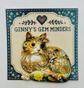 Floral crystal cat needle minder on display card