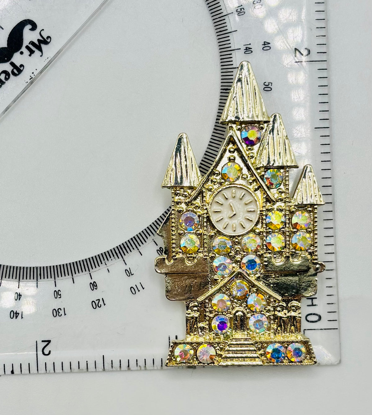 Beautiful Gold and Crystal Cinderella’s Castle Needle Minder — ruler
