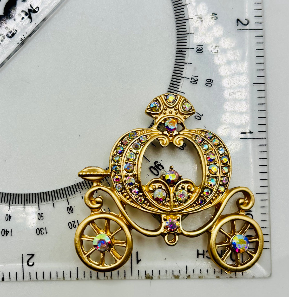 Beautiful Gold and Crystal Pumpkin Carriage Needle Minder — ruler