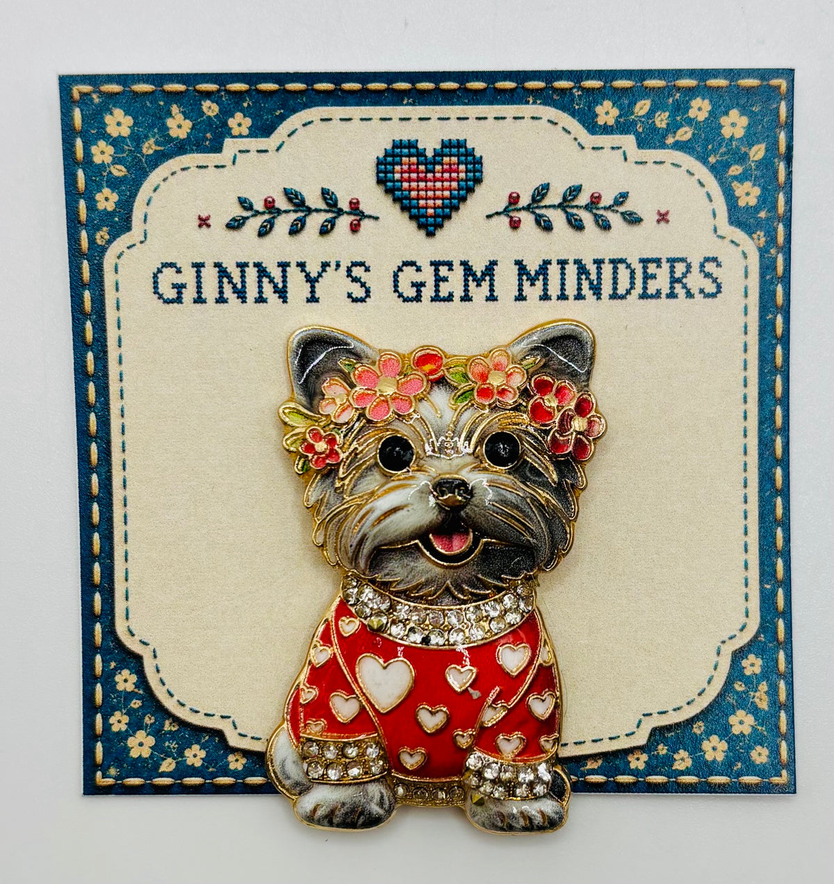 Gray dog in red heart sweater needle minder on display card