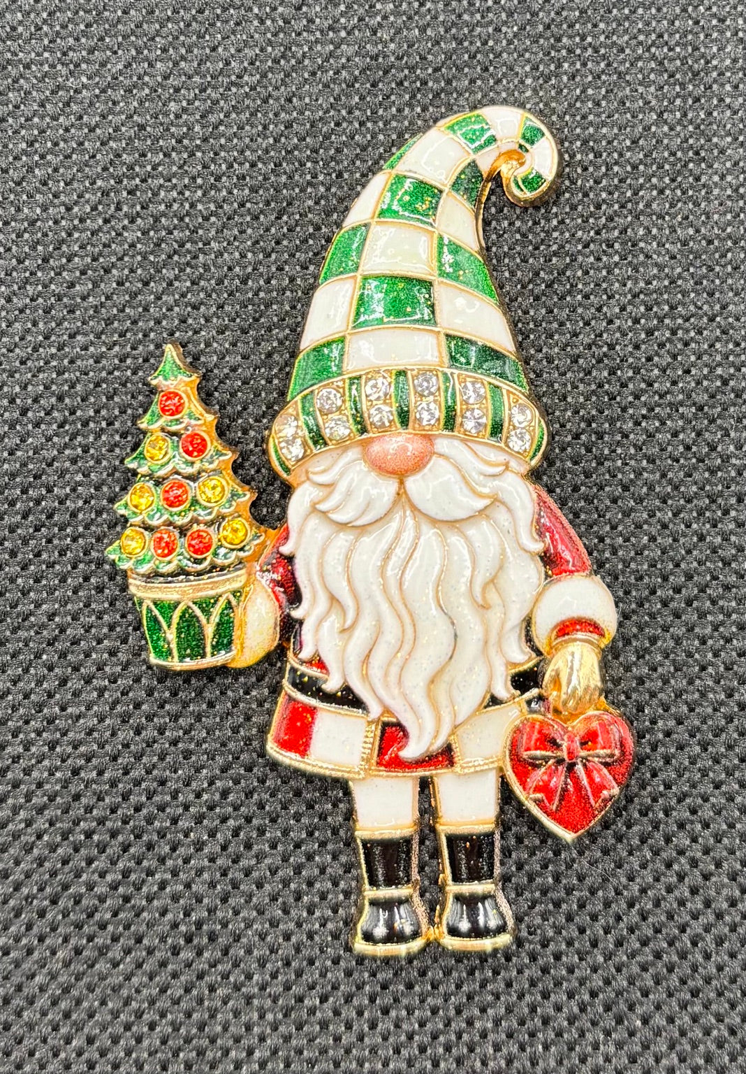 Lovely Green Hat Gnome Needle Minder on dark fabric