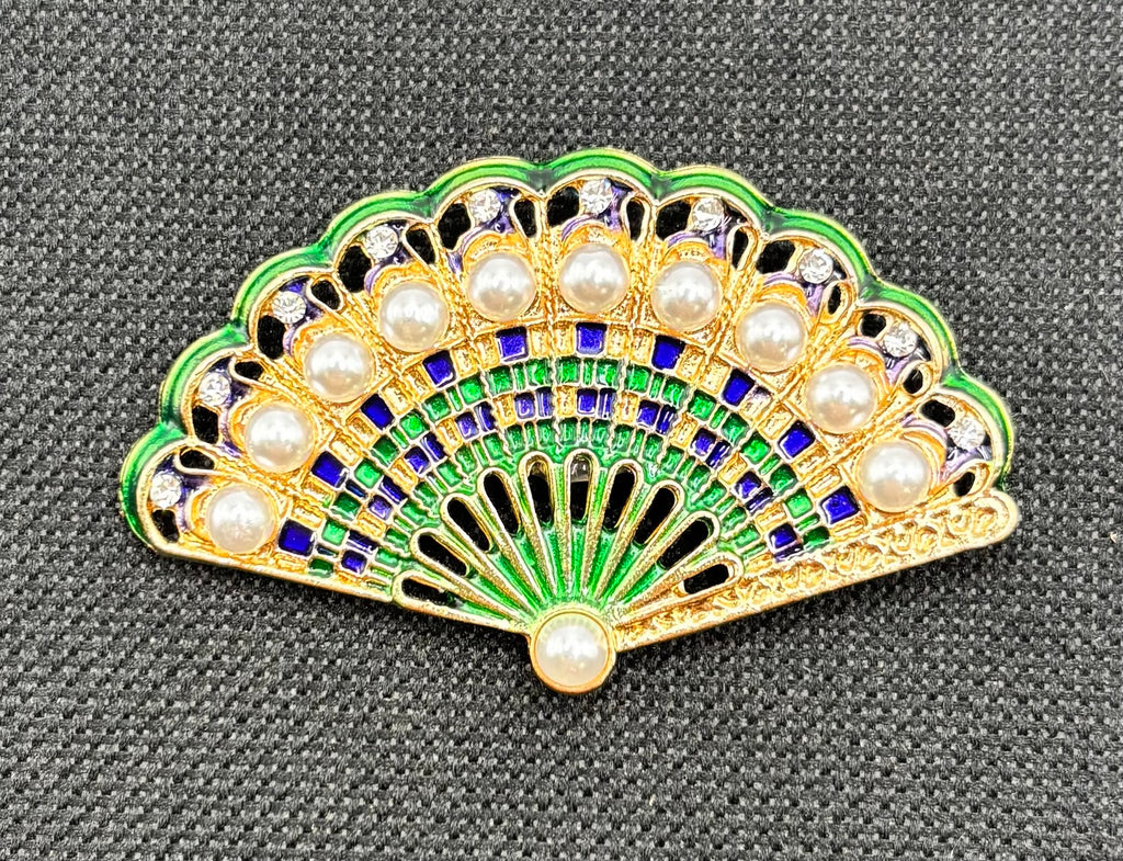 Lovely Green and Pearl Fan Needle Minder — dark fabric