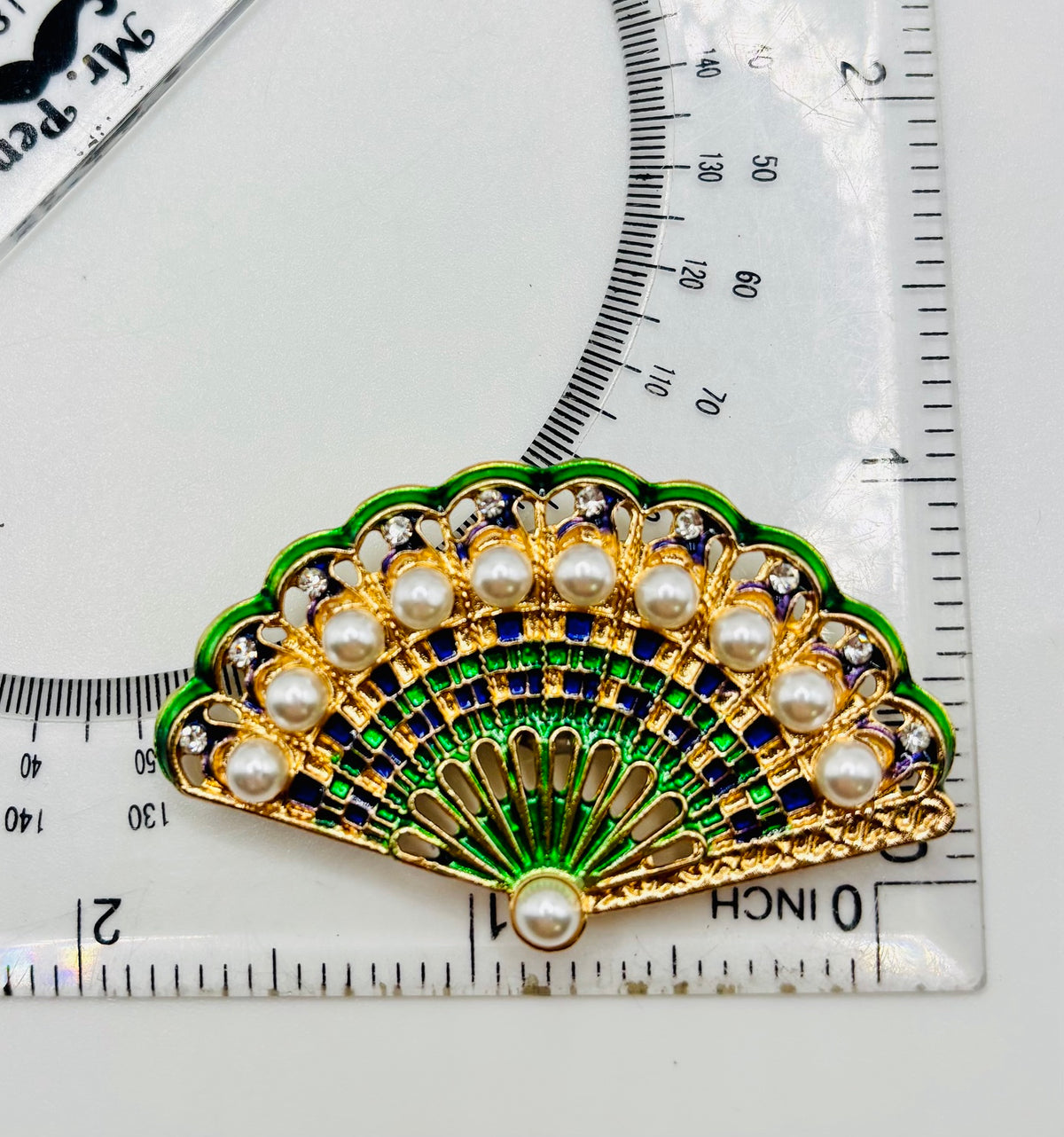 Lovely Green and Pearl Fan Needle Minder — ruler