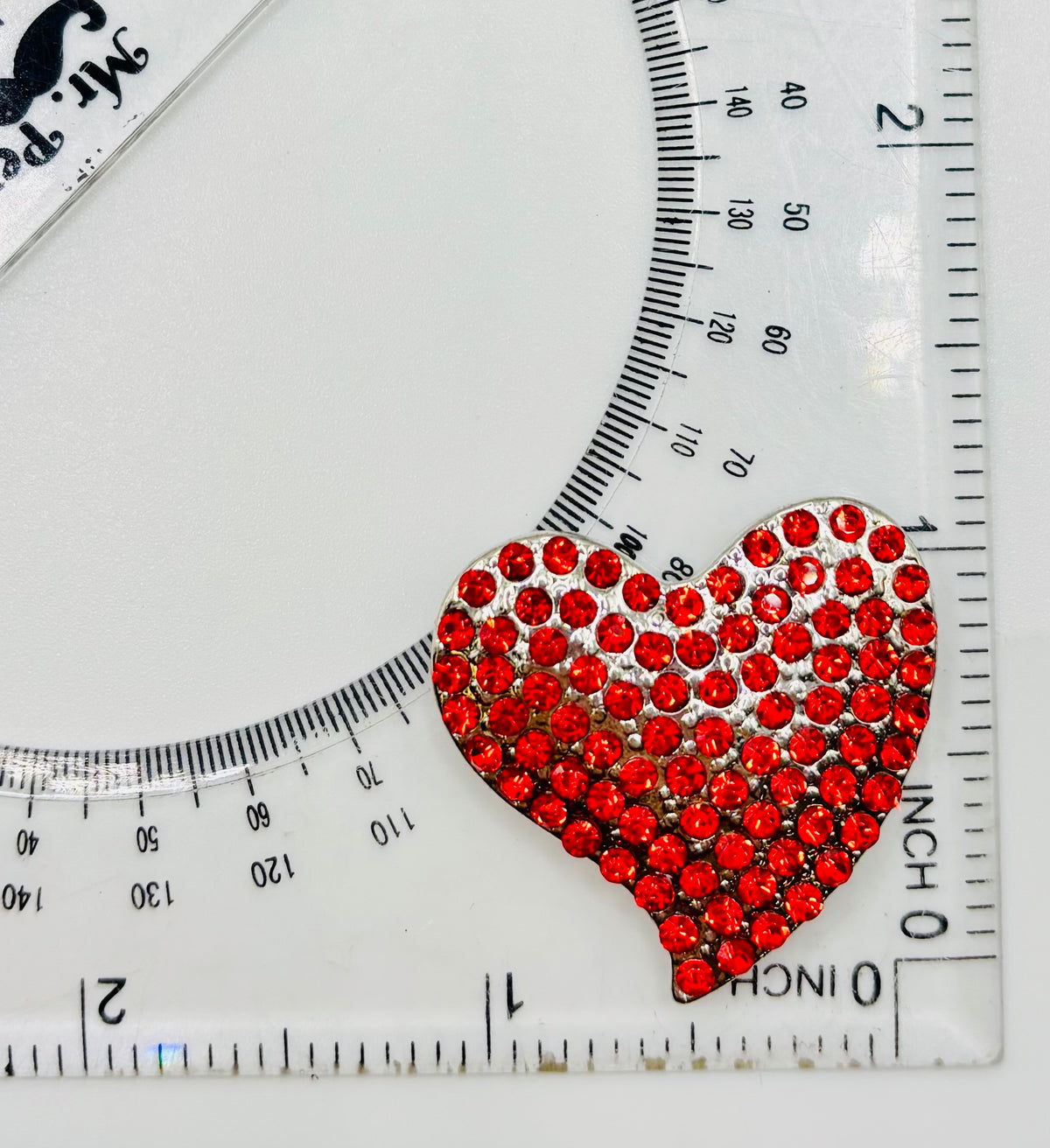 Lovely Little Red Crystal Heart Needle Minder — ruler