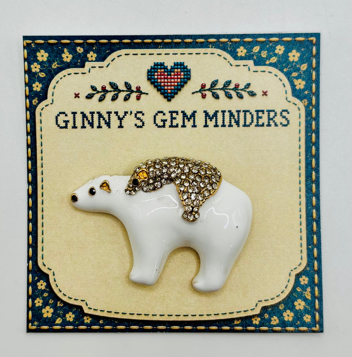 Momma and baby polar bear needle minder on display card