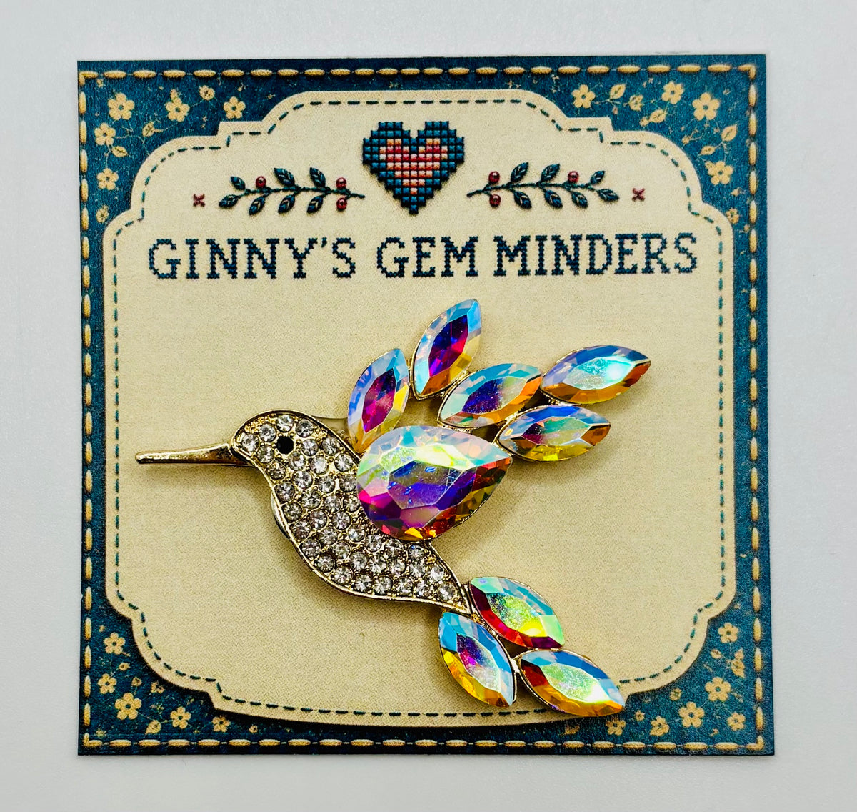 Opalescent crystal hummingbird needle minder — display card