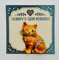 Orange tabby cat kitty needle minder on display card