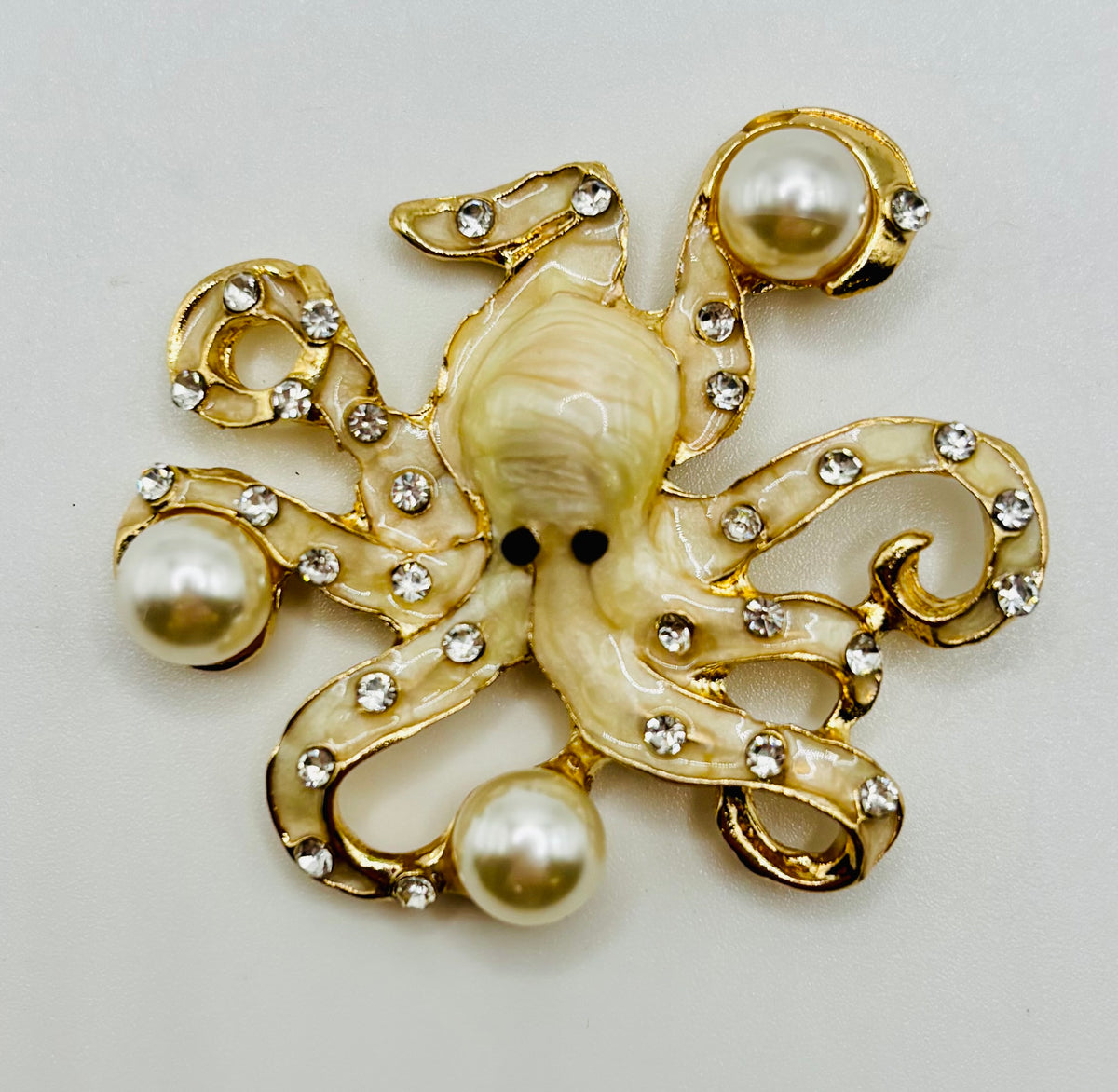 Stunning Pearl Octopus Needle Minder on white background