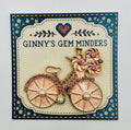 Very Pretty Pink Enamel Bicycle Needle Minder — display card