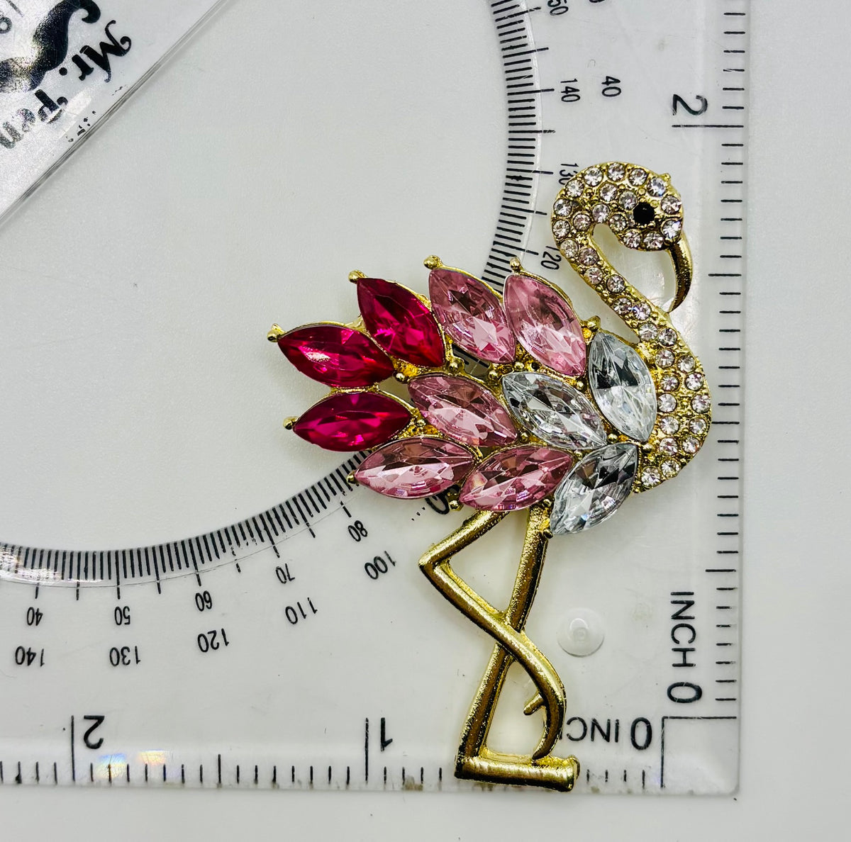 Pink crystal flamingo needle minder — ruler scale