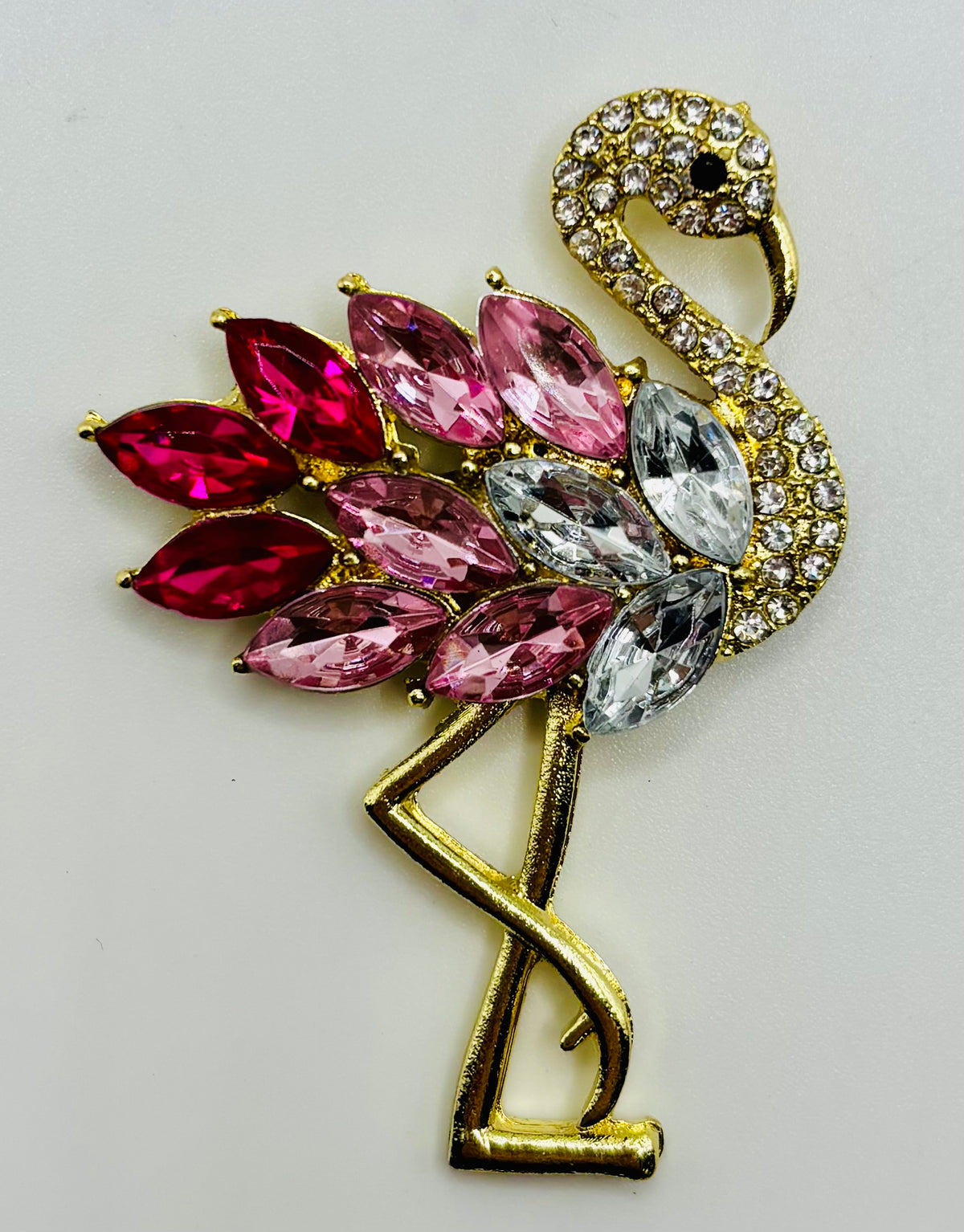 Pink crystal flamingo needle minder — white background