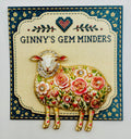 Pink flower sheep needle minder on display card
