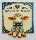 Blue bow lamb needle minder on display card