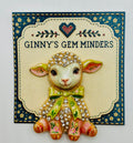 Pink lamb green bow needle minder on display card