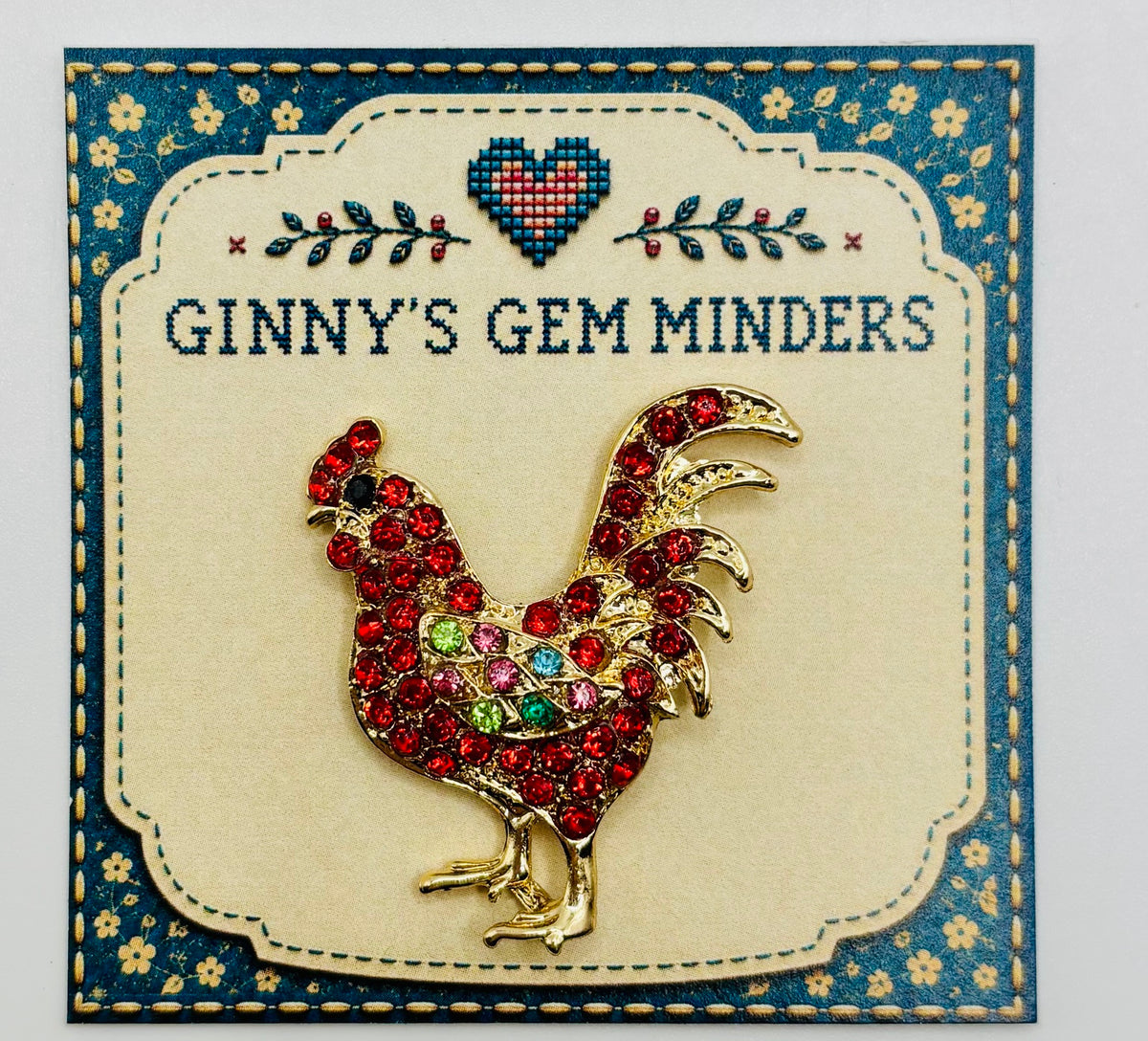 Red crystal chicken needle minder — display card