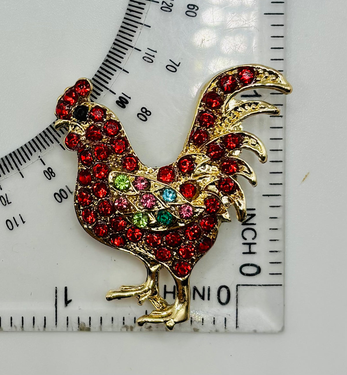 Red crystal chicken needle minder — ruler scale