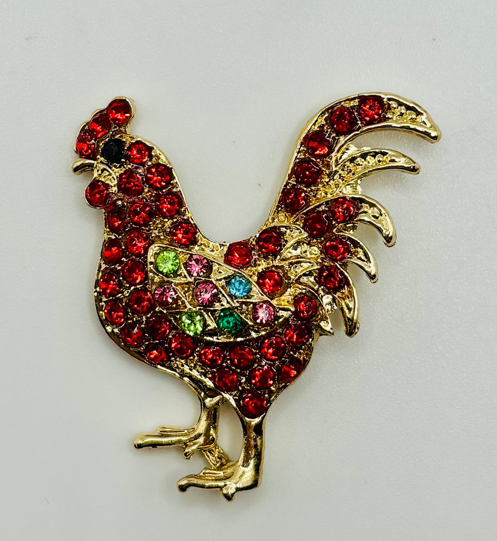Red crystal chicken needle minder — white background