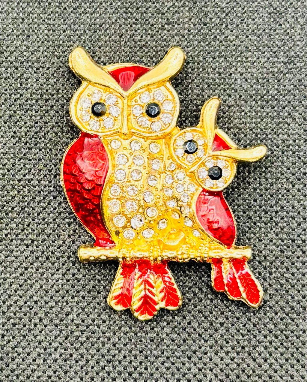 Red enamel and crystal owl pair needle minder — dark fabric