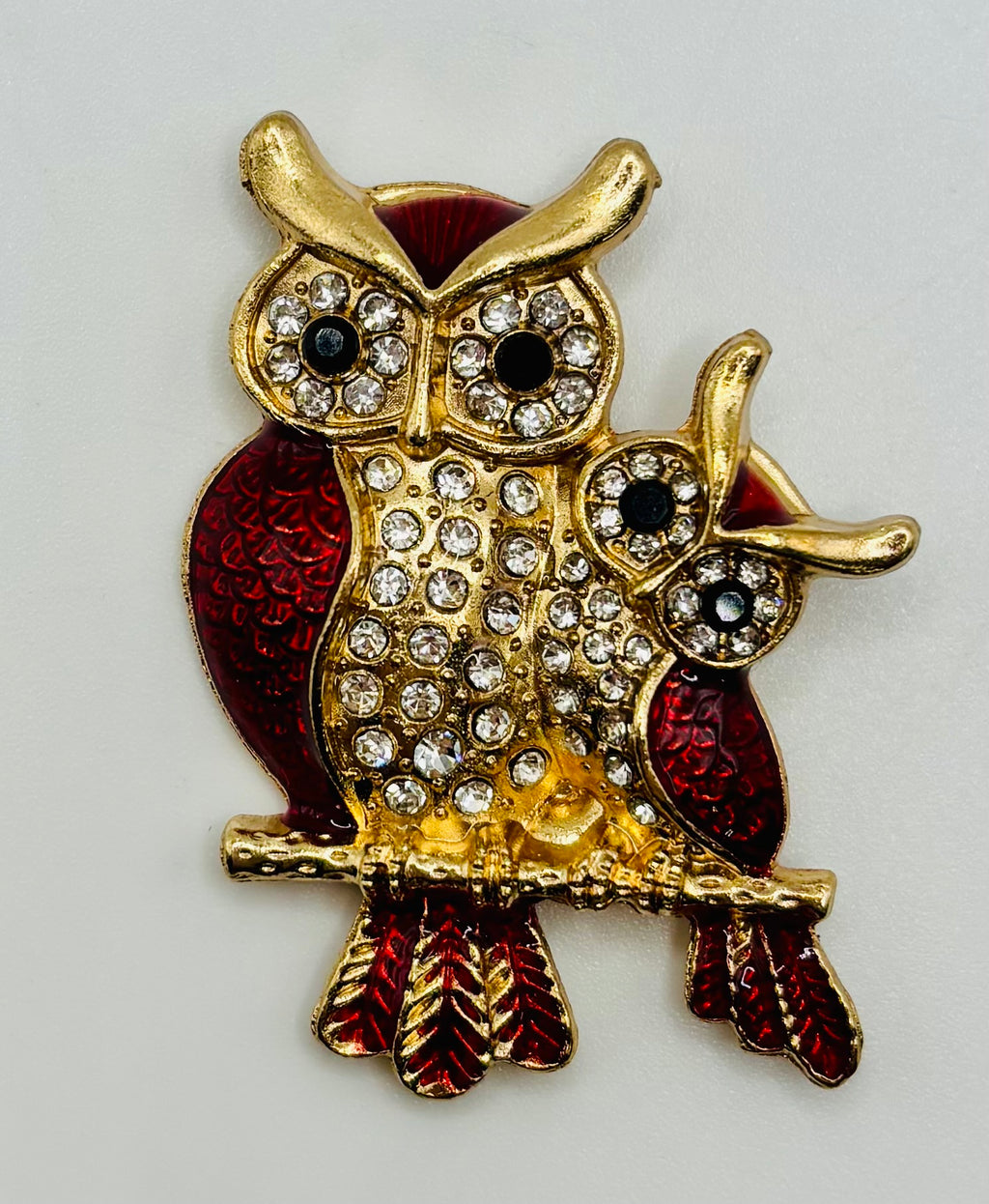 Red enamel and crystal owl pair needle minder — white background