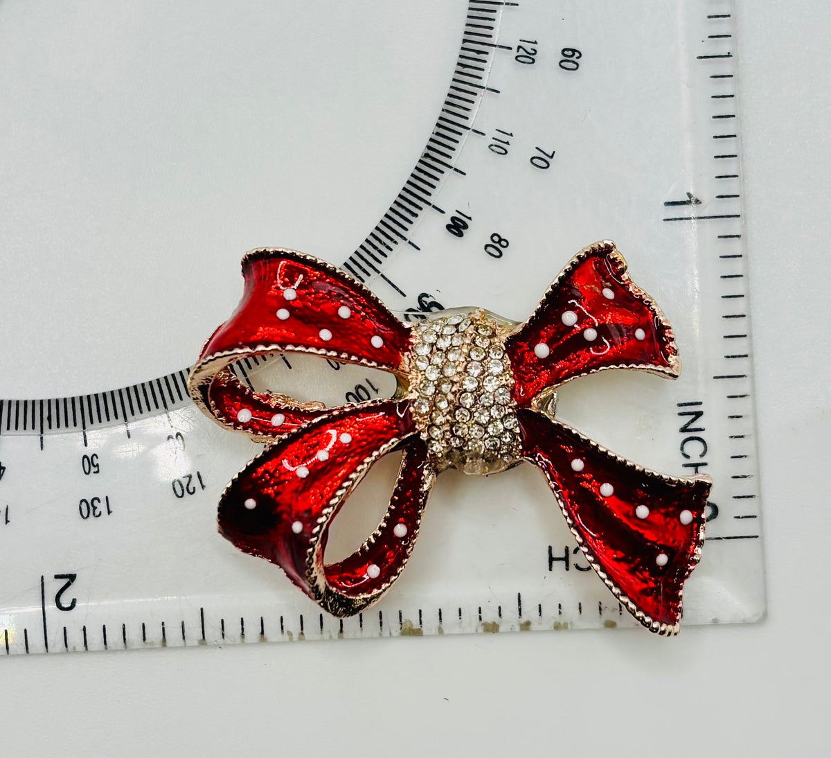 Lovely Red and White Polka Dot Bow Needle Minder — ruler