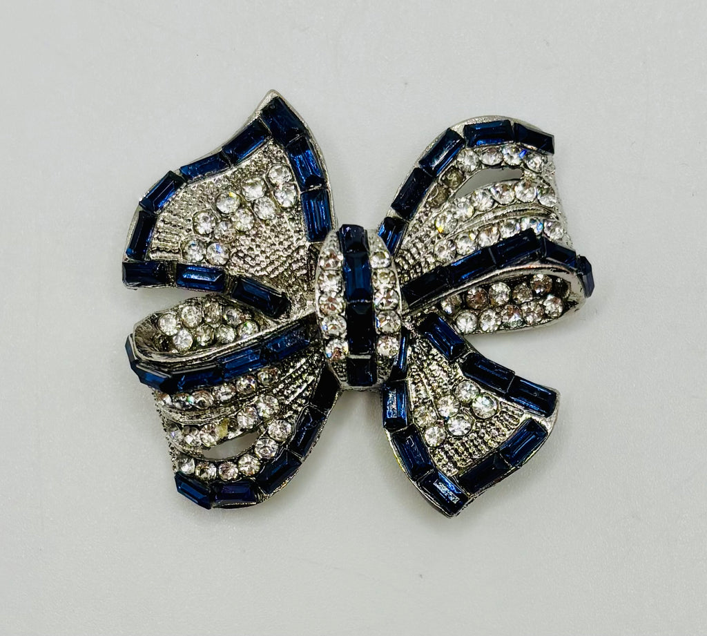 Beautiful Sapphire Blue and Crystal Bow Needle Minder — white background