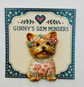 Tan dog in pink heart sweater needle minder on display card