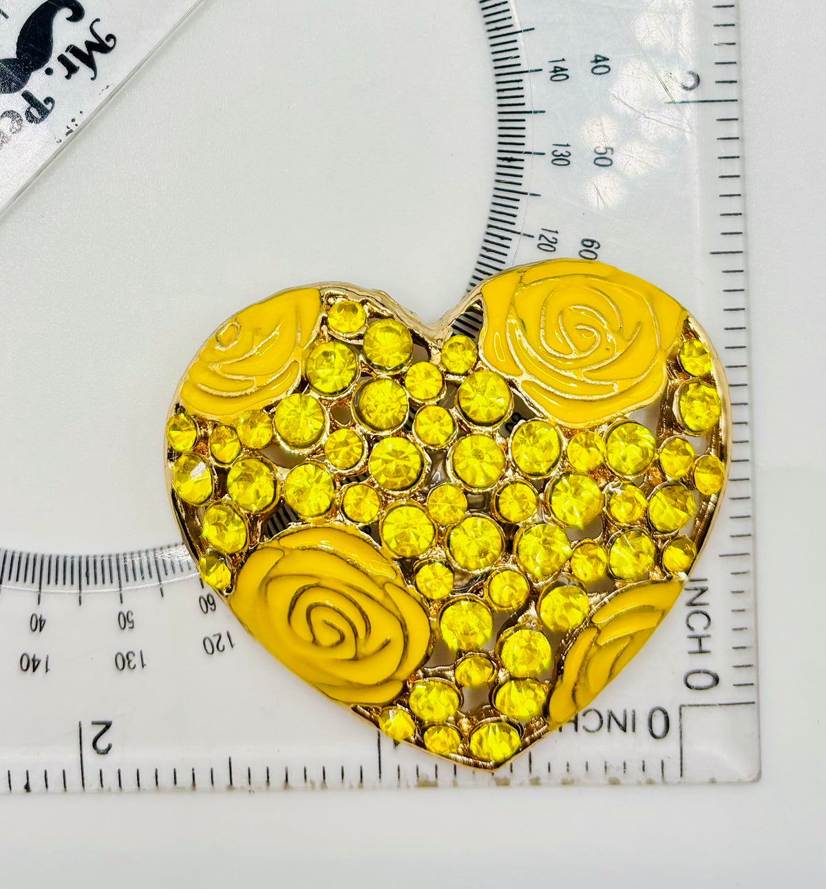 Pretty Yellow Roses Crystal Heart Needle Minder — ruler